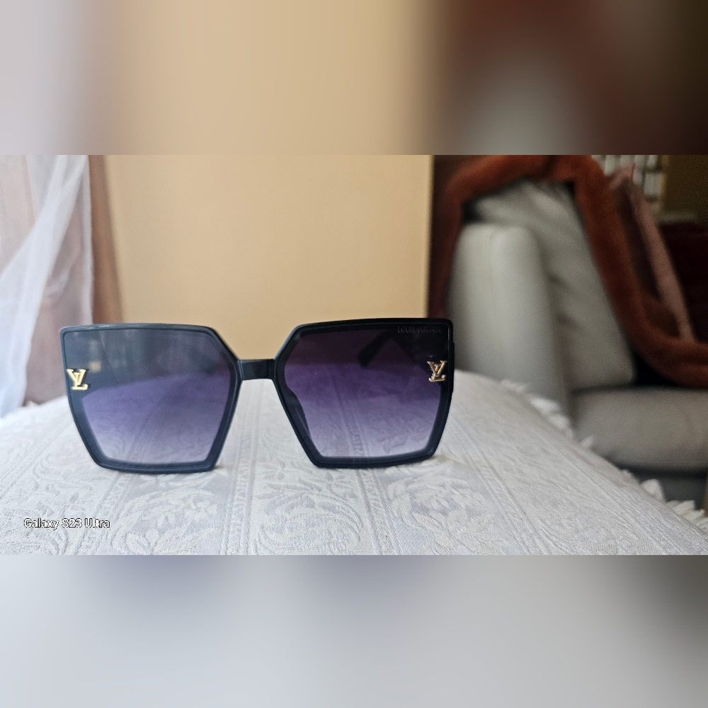Elegant Black Sunglasses Price Reflects $70